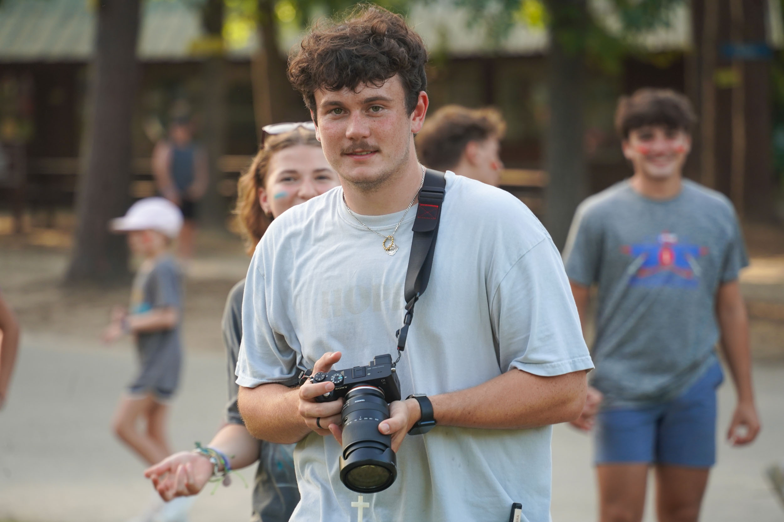 Matt holding camera